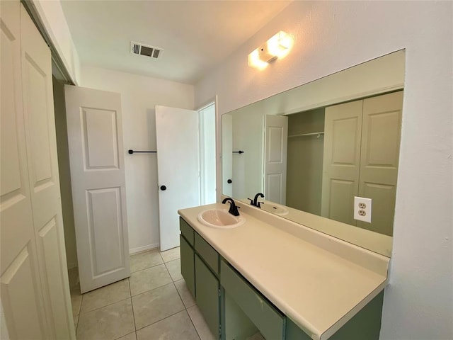 12318 Marogot Run, Austin, TX 78758 - full bath featuring vanity and tile patterned floors