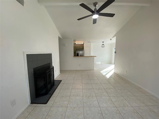12318 Marogot Run, Austin, TX 78758 - unfurnished living room with ceiling fan, a fireplace, light tile patterned floors, and high vaulted ceiling
