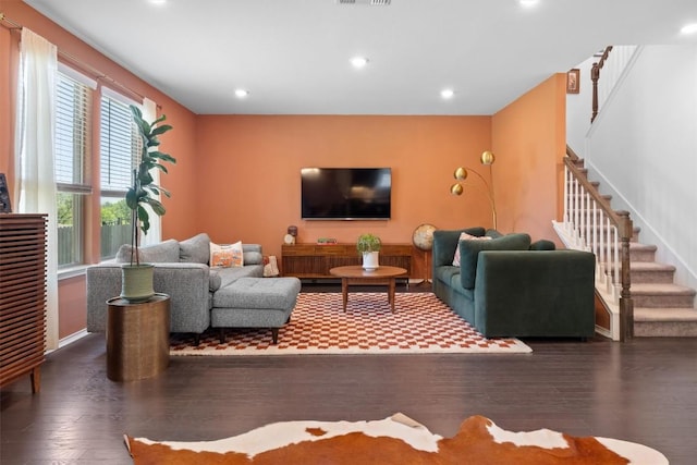 6809 Ellsworth Walk, Austin, TX 78724 - living area featuring stairs, wood finished floors, recessed lighting, and baseboards