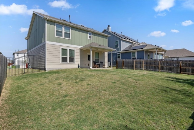 6809 Ellsworth Walk, Austin, TX 78724 - rear view of property featuring a patio area and board and batten siding