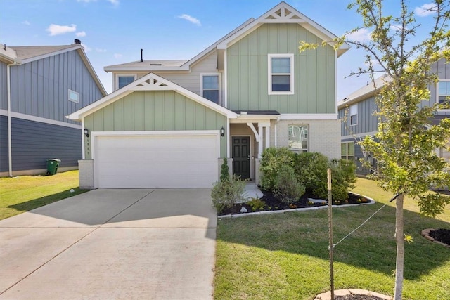 6809 Ellsworth Walk, Austin, TX 78724 - view of front of house featuring board and batten siding, a front yard, driveway, and an attached garage