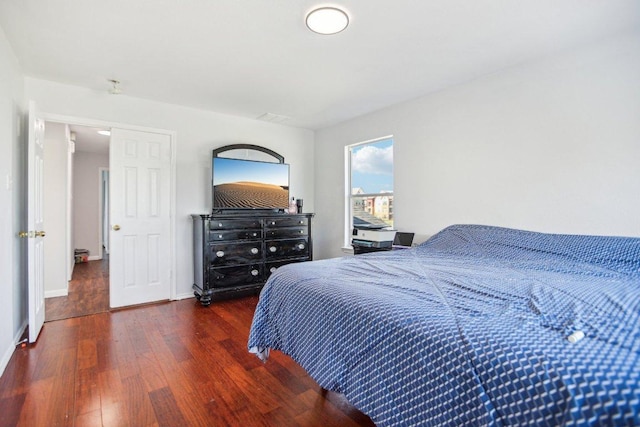 339 Liberty St, Hutto, TX 78634 - bedroom with wood finished floors and baseboards
