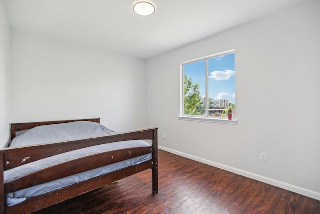 339 Liberty St, Hutto, TX 78634 - bedroom with wood finished floors and baseboards