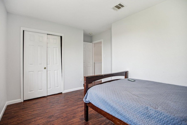 339 Liberty St, Hutto, TX 78634 - bedroom featuring wood finished floors and a closet