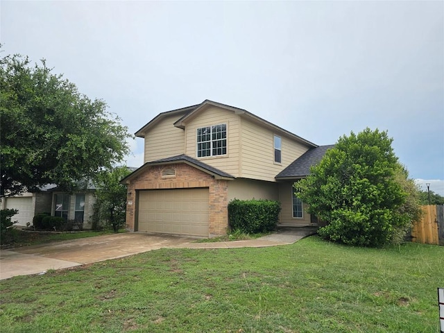 339 Liberty St, Hutto, TX 78634 - traditional-style house featuring a garage, concrete driveway, and brick siding
