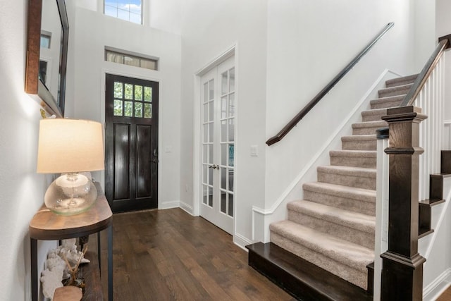 12705 Mitica Dr, Austin, TX 78739 - entrance foyer featuring baseboards, wood finished floors, and stairs