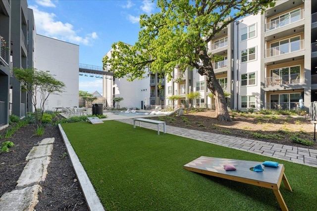 4801 Springdale Rd Unit 1107, Austin, TX 78723 - surrounding community featuring a lawn