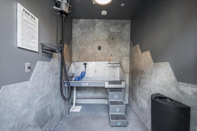 4801 Springdale Rd Unit 1107, Austin, TX 78723 - misc room with a textured wall