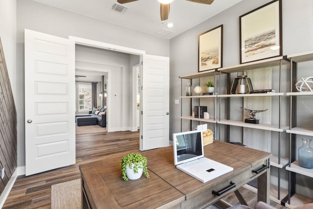328 Ridgewell Loop, Georgetown, TX 78633 - home office featuring a ceiling fan, baseboards, and wood finished floors