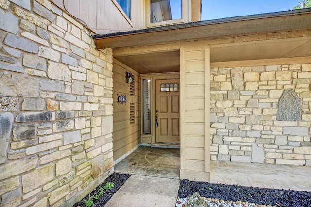 2109 Delvin Ln, Austin, TX 78728 - doorway to property with stone siding
