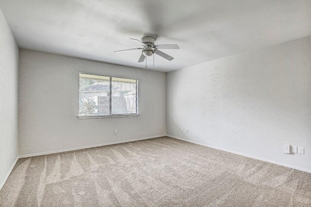 2109 Delvin Ln, Austin, TX 78728 - unfurnished room featuring carpet floors, ceiling fan, and baseboards