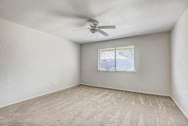 2109 Delvin Ln, Austin, TX 78728 - carpeted empty room featuring ceiling fan and baseboards