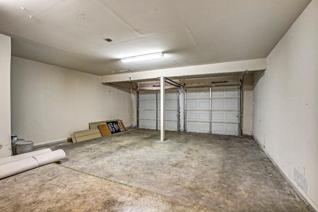 2109 Delvin Ln, Austin, TX 78728 - garage featuring baseboards