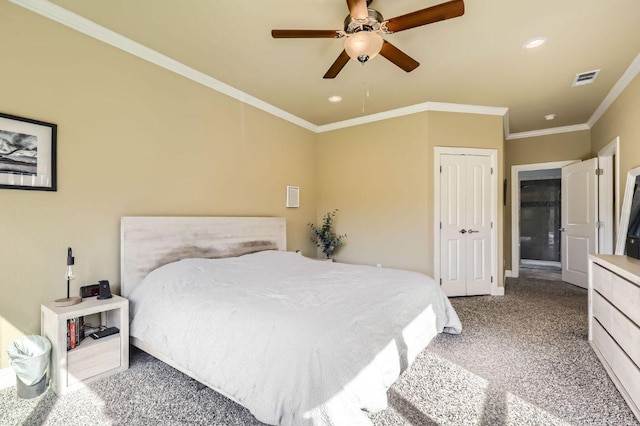 611 Algerita Dr, Georgetown, TX 78628 - bedroom with carpet flooring, crown molding, recessed lighting, a ceiling fan, and a closet