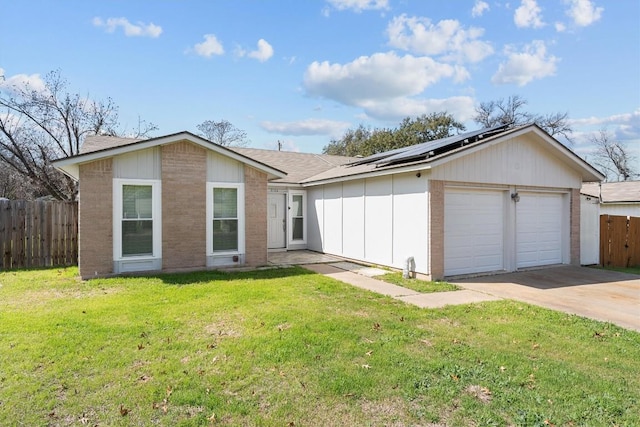3504 Valley Pike Rd, Cedar Park, TX 78613 - view of front of house with an attached garage, roof mounted solar panels, driveway, a shingled roof, and board and batten siding