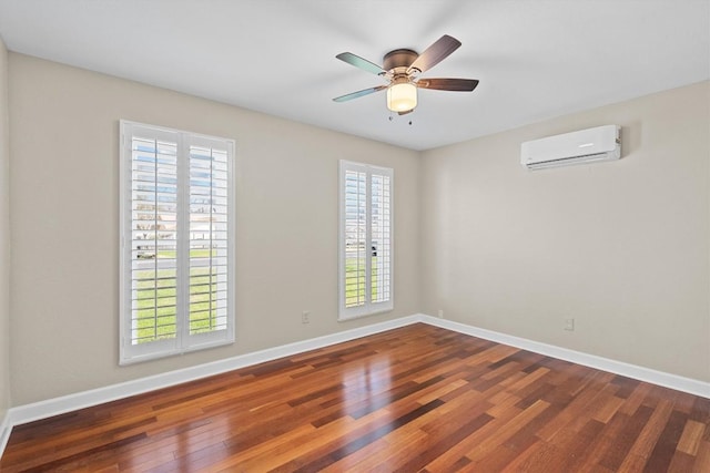 3504 Valley Pike Rd, Cedar Park, TX 78613 - unfurnished room with a wall mounted air conditioner, wood finished floors, and baseboards