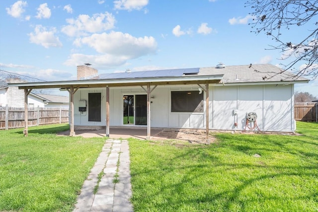 3504 Valley Pike Rd, Cedar Park, TX 78613 - rear view of house featuring a patio area, a chimney, and roof mounted solar panels