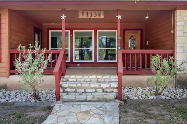 11134 Bonham Ranch Rd, Dripping Springs, TX 78620 - doorway to property with a porch