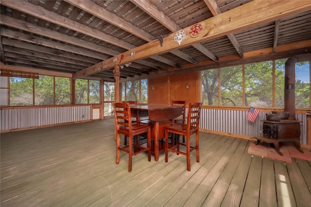 11134 Bonham Ranch Rd, Dripping Springs, TX 78620 - sunroom featuring a wood stove and outdoor dining area