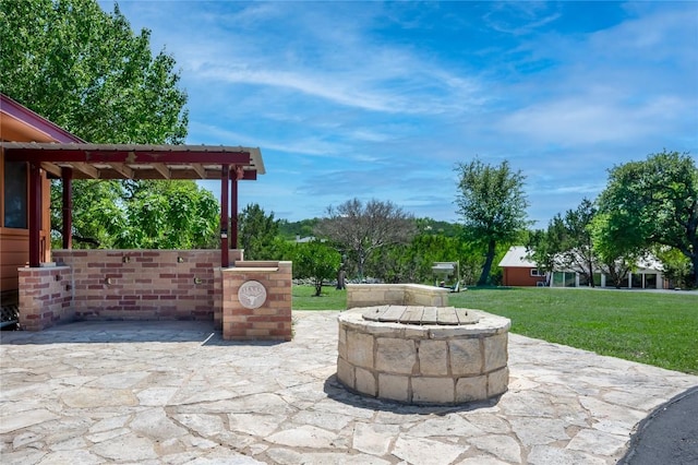 11134 Bonham Ranch Rd, Dripping Springs, TX 78620 - view of patio with an outdoor fire pit
