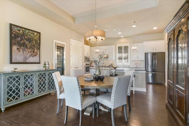 101 Amiata Ave Unit 104, Austin, TX 78734 - dining room with a chandelier, dark wood-style floors, and recessed lighting