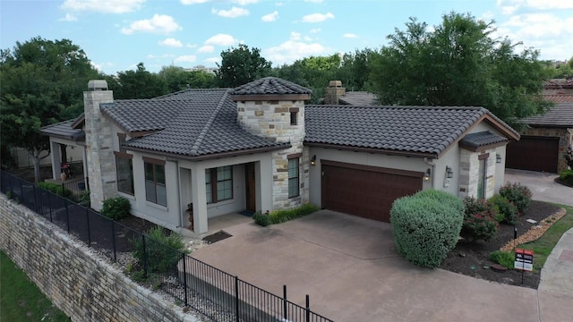 101 Amiata Ave Unit 104, Austin, TX 78734 - mediterranean / spanish-style house with a tile roof, stone siding, a chimney, and stucco siding