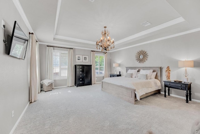 1505 Lake Forest Cv, Round Rock, TX 78665 - carpeted bedroom featuring a tray ceiling, a chandelier, baseboards, and ornamental molding