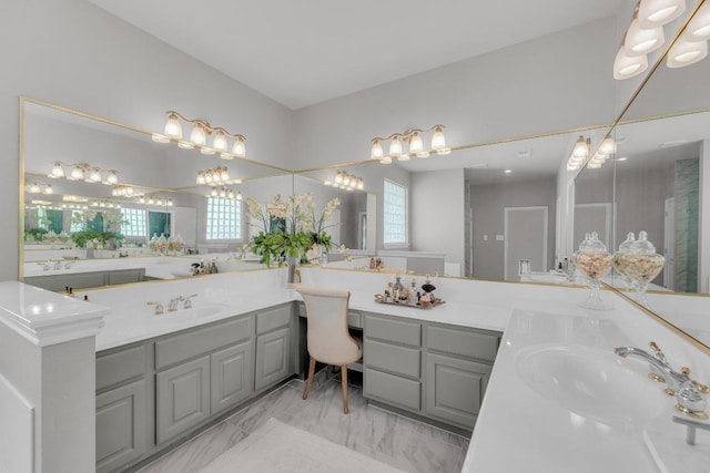 1505 Lake Forest Cv, Round Rock, TX 78665 - full bath with two vanities, healthy amount of natural light, and marble finish floors
