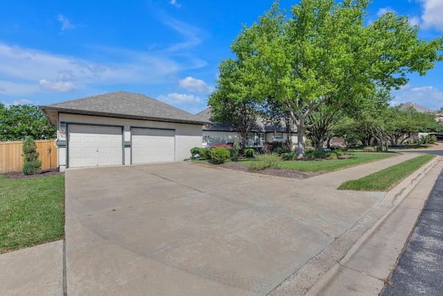 1505 Lake Forest Cv, Round Rock, TX 78665 - view of front of property featuring concrete driveway, stucco siding, and a shingled roof