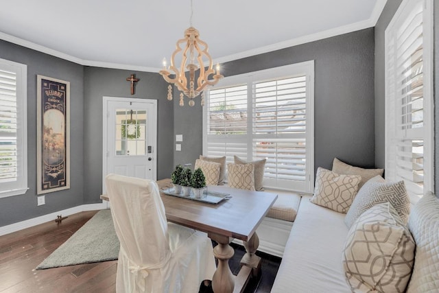 1505 Lake Forest Cv, Round Rock, TX 78665 - dining room with crown molding, plenty of natural light, a chandelier, dark wood-type flooring, and baseboards
