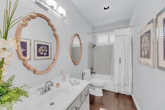 1505 Lake Forest Cv, Round Rock, TX 78665 - full bathroom with wood finished floors, vanity, toilet, and shower / bath combination with curtain