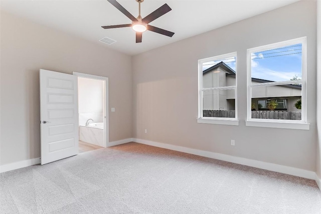 650 Aspen Ln, Cottonwood Shores, TX 78657 - spare room with light carpet and a ceiling fan