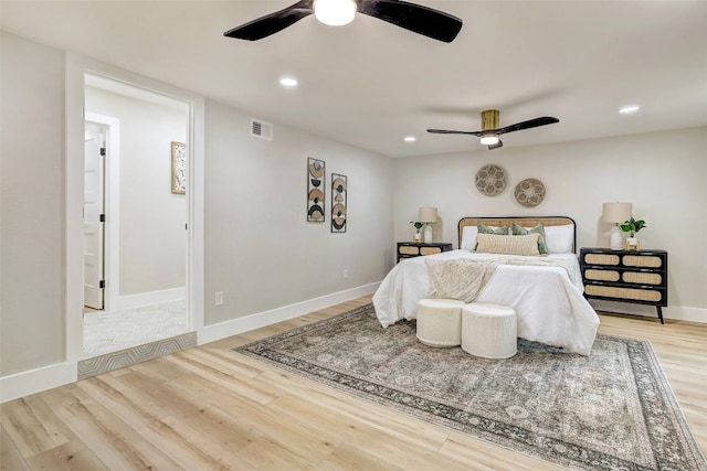 6007 Belfast Dr, Austin, TX 78723 - bedroom with light wood-type flooring, recessed lighting, and ceiling fan