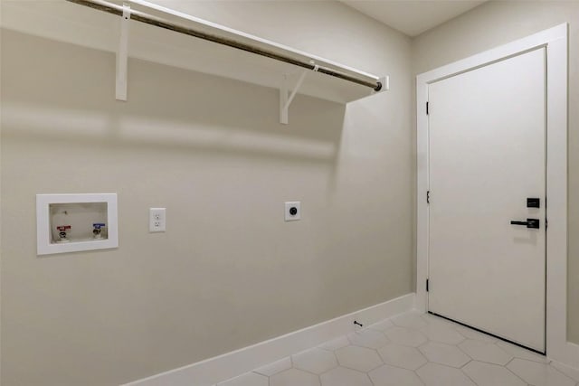 6007 Belfast Dr, Austin, TX 78723 - washroom featuring hookup for an electric dryer, washer hookup, and light tile patterned floors