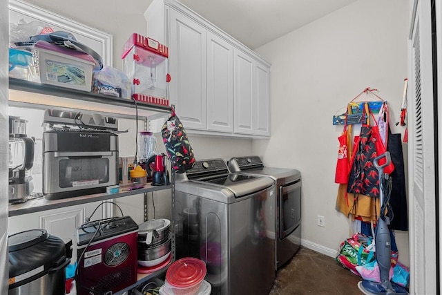 201 Loving Trl, Dripping Springs, TX 78620 - washroom featuring washing machine and dryer, baseboards, and dark tile patterned flooring