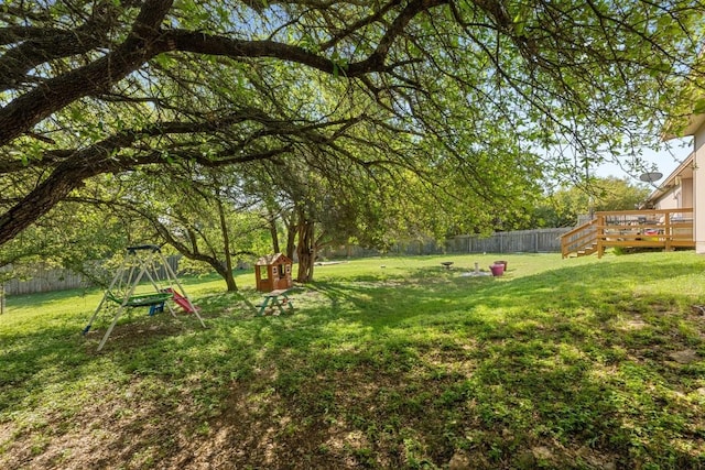201 Loving Trl, Dripping Springs, TX 78620 - view of yard featuring a wooden deck