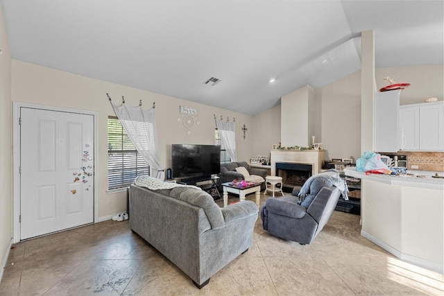 201 Loving Trl, Dripping Springs, TX 78620 - living room featuring a fireplace, baseboards, and high vaulted ceiling