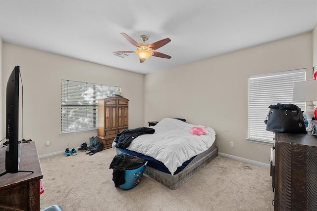 201 Loving Trl, Dripping Springs, TX 78620 - bedroom with carpet floors, baseboards, and multiple windows