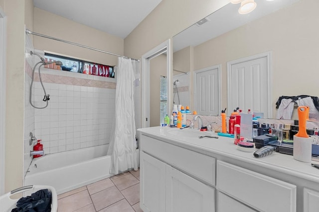 201 Loving Trl, Dripping Springs, TX 78620 - bathroom with tile patterned floors, vanity, and shower / bath combination with curtain
