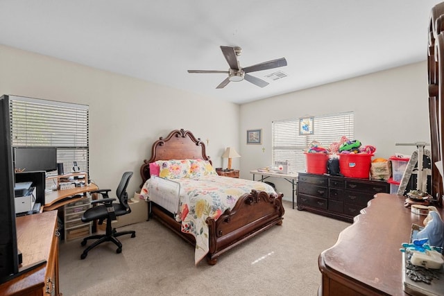 201 Loving Trl, Dripping Springs, TX 78620 - bedroom with light colored carpet, an office area, and a ceiling fan
