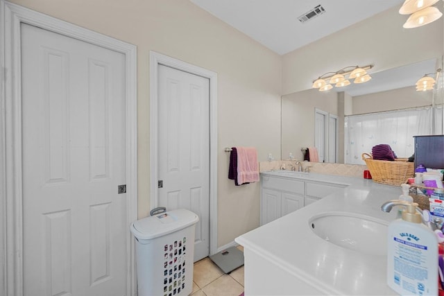 201 Loving Trl, Dripping Springs, TX 78620 - bathroom featuring double vanity and tile patterned flooring