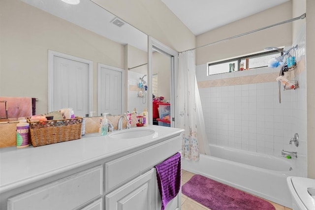 201 Loving Trl, Dripping Springs, TX 78620 - full bath with shower / bath combo, vanity, and tile patterned floors