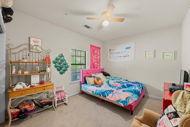 201 Loving Trl, Dripping Springs, TX 78620 - carpeted bedroom with baseboards and ceiling fan