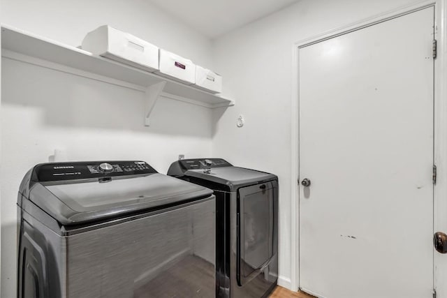 206 Quail Cir, Hutto, TX 78634 - washroom featuring washer and dryer and light wood-style flooring