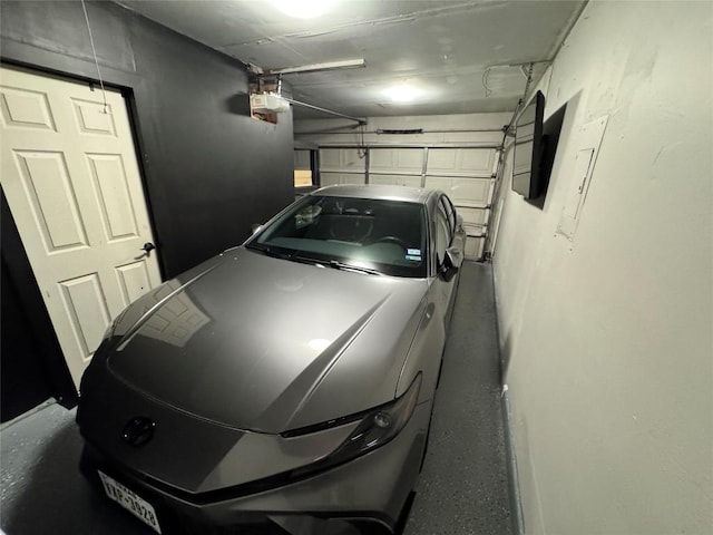 garage featuring a garage door opener