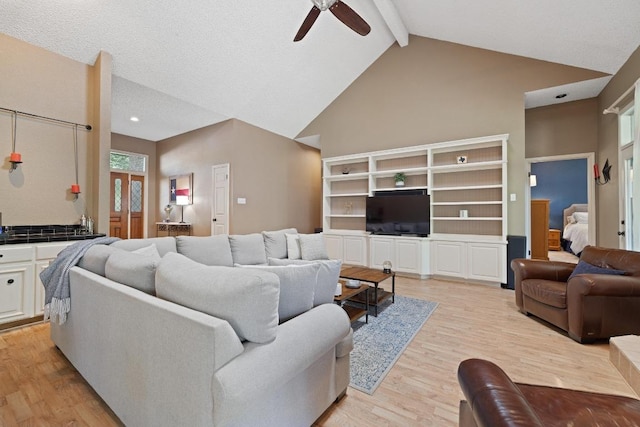 7303 Bluntleaf Cv, Austin, TX 78750 - living area with ceiling fan, light wood-style flooring, beam ceiling, high vaulted ceiling, and recessed lighting