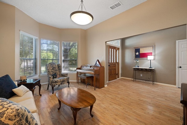 7303 Bluntleaf Cv, Austin, TX 78750 - sitting room featuring light wood-style floors