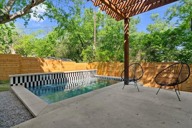 view of patio / terrace with a fenced backyard and a pergola