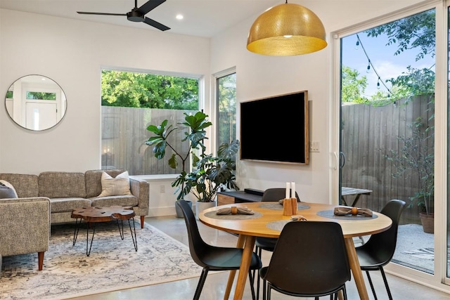 4907 Delores Ave, Austin, TX 78721 - dining space featuring a ceiling fan, recessed lighting, and concrete floors