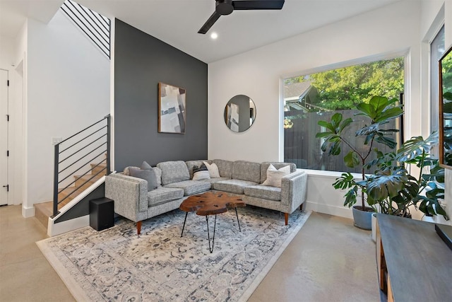 4907 Delores Ave, Austin, TX 78721 - living area with concrete floors, ceiling fan, plenty of natural light, and recessed lighting